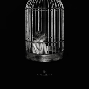 Child trafficking and a child that has been caged in an old style bird cage waiting taken by Red Deer Photography studio First Blush Photography